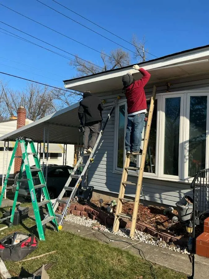 Restoration crew performing exterior repair in Brewster