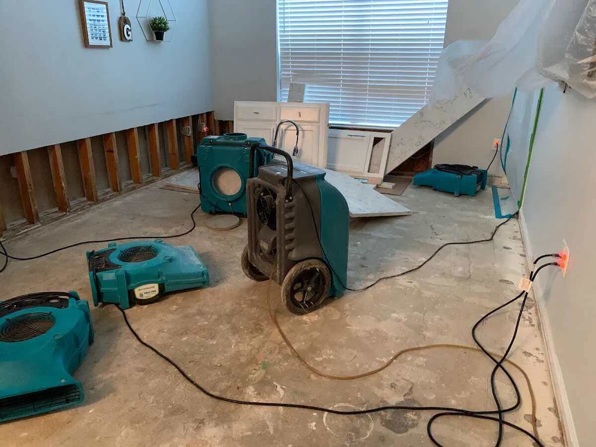 Dehumidifier in flood-cut room for Water Damage Restoration in Brewster
